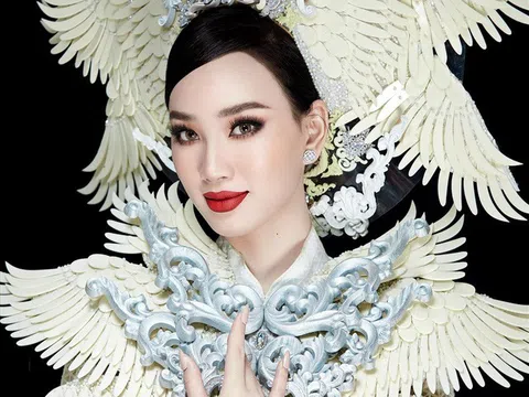 Ái Nhi trình diễn áo dài nặng 30kg tại Miss Intercontinental 2021